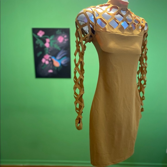 Brand: Another Story
Product: Fitted Mini Dress w/Diamond Peek-A-Boo Sleeves - Picture 11 of 11